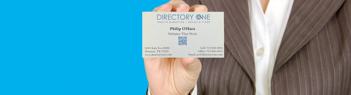 A variety of collateral materials like brochures, business cards, and flyers laid out on a table.